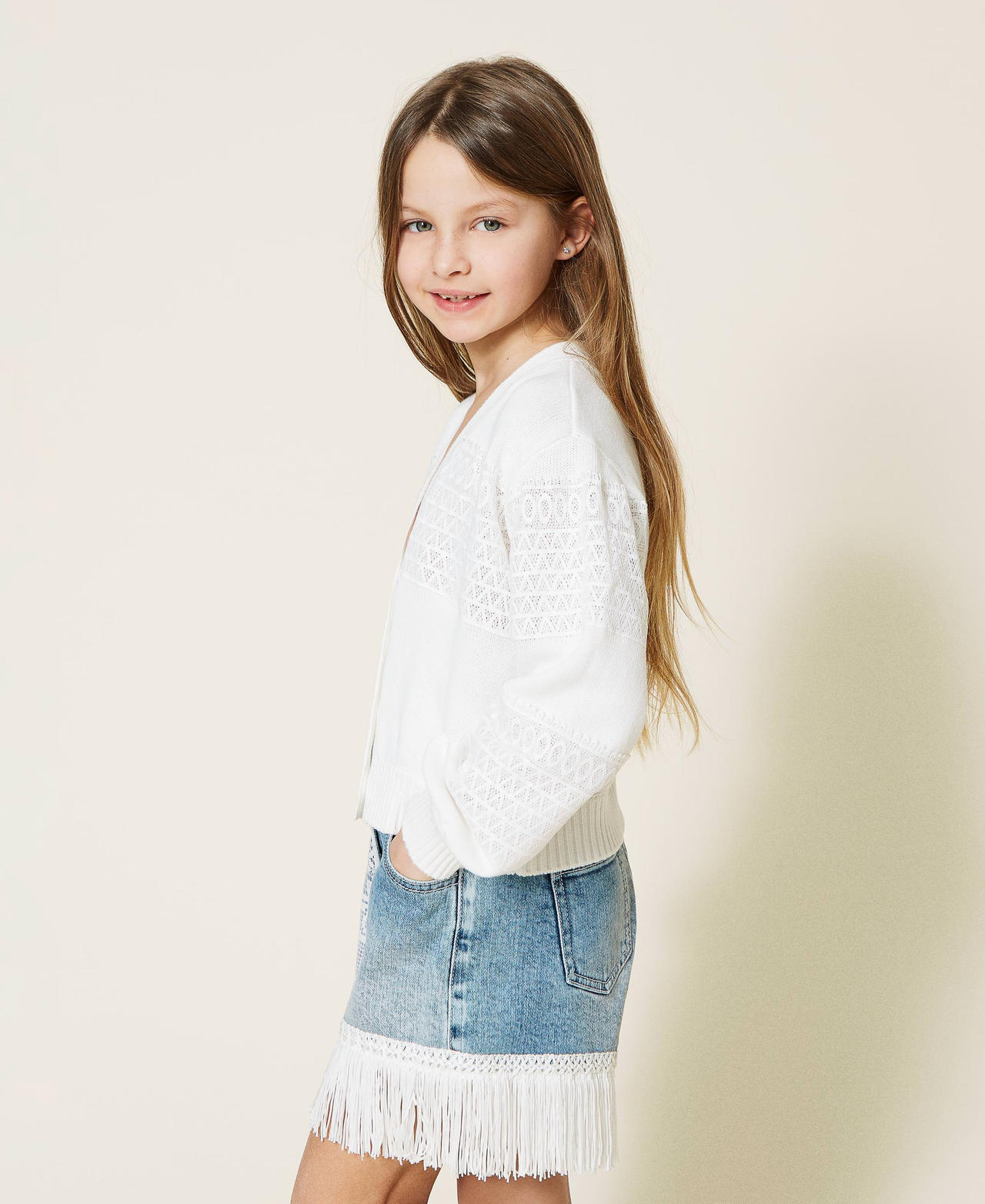 Denim shorts with lace and fringes