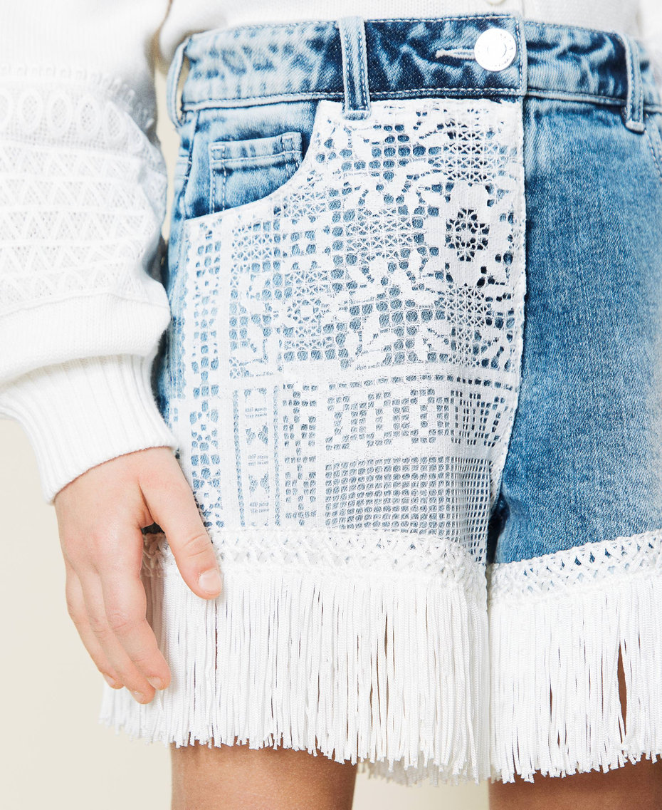 Denim shorts with lace and fringes