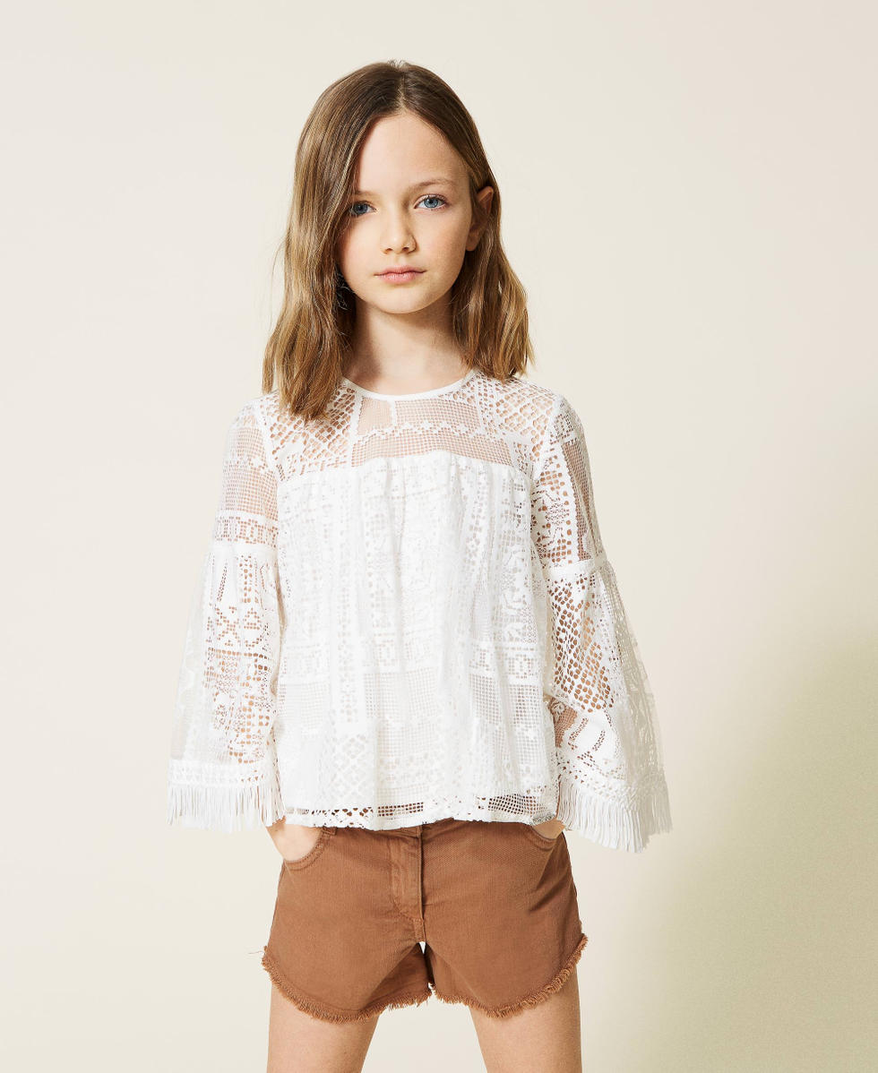 Lace blouse with fringes
