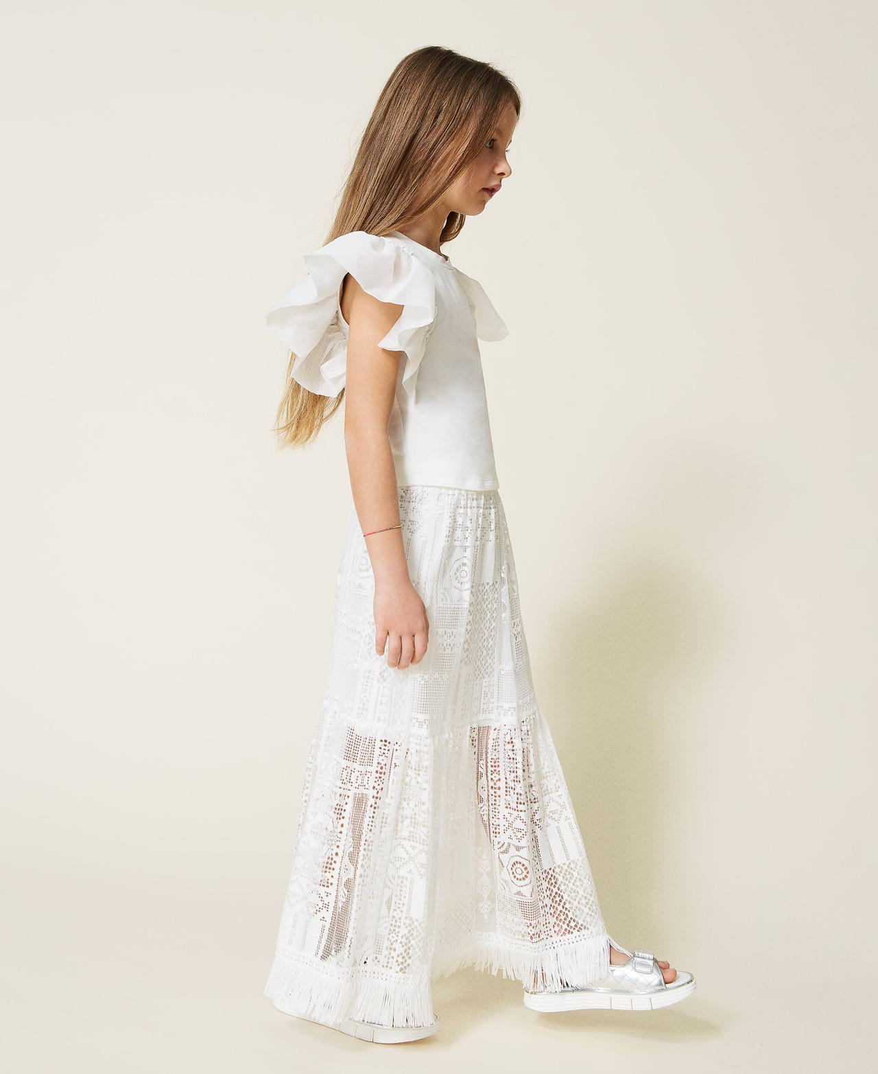 Top with organza sleeves