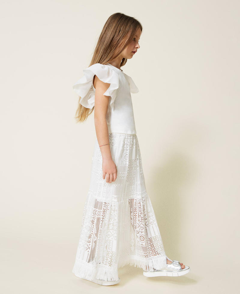 Top with organza sleeves