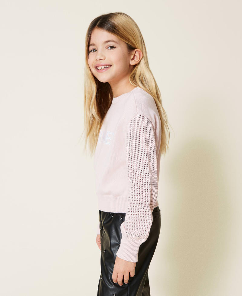 Jumper with openwork sleeves