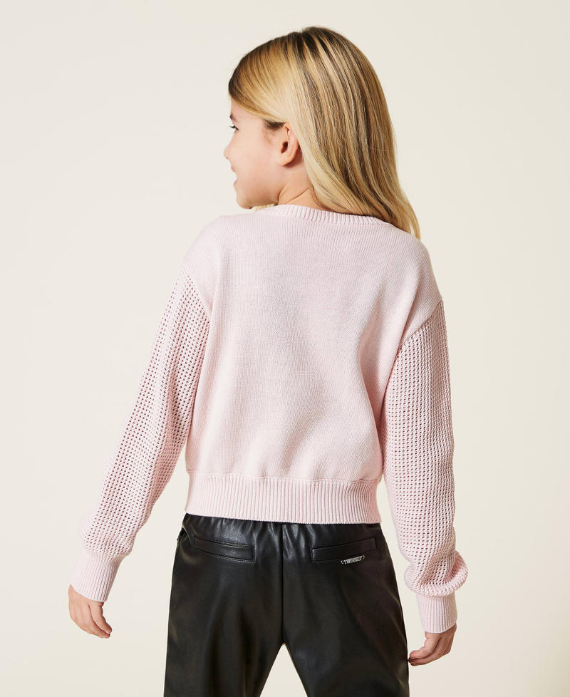 Jumper with openwork sleeves