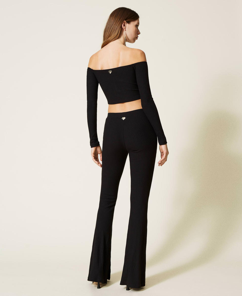 Ribbed flared trousers Woman, Black