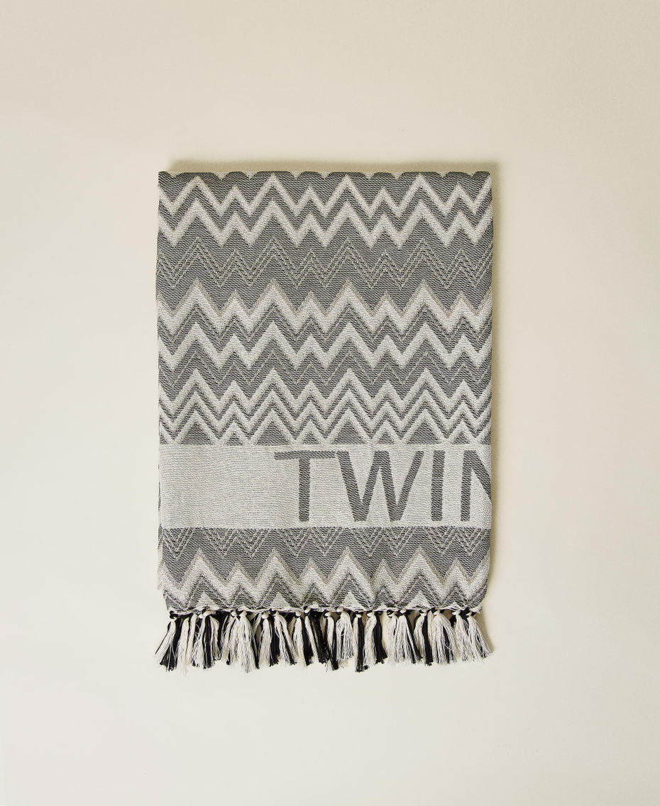 Jacquard beach towel with logo and fringes