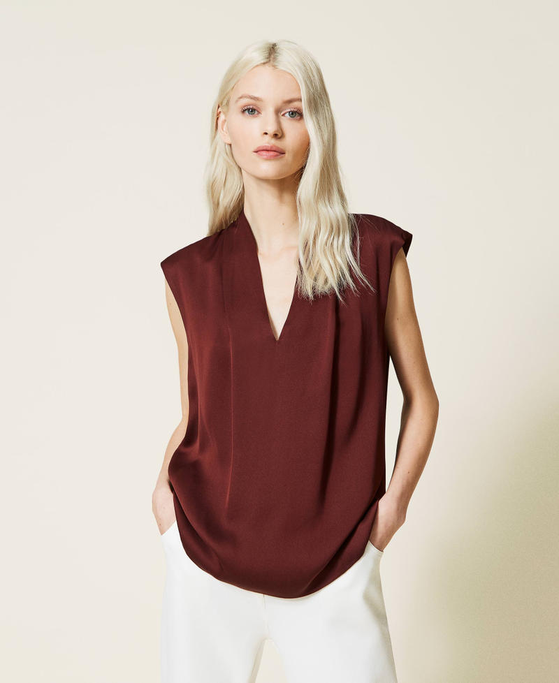 Top con manga casquillo