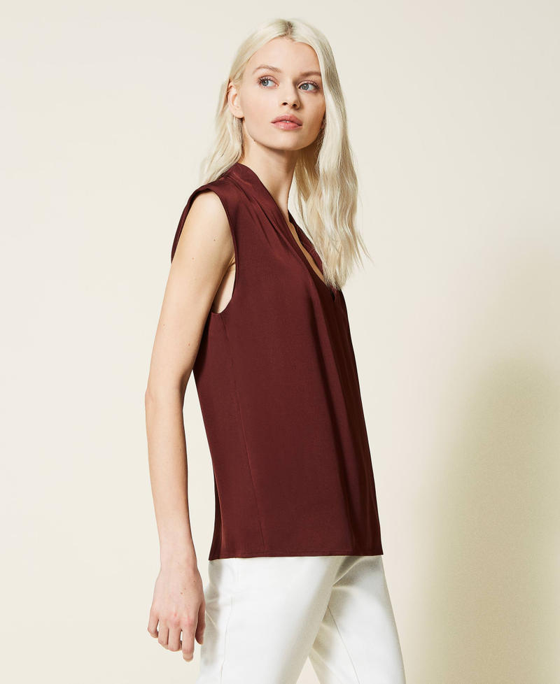 Top con manga casquillo