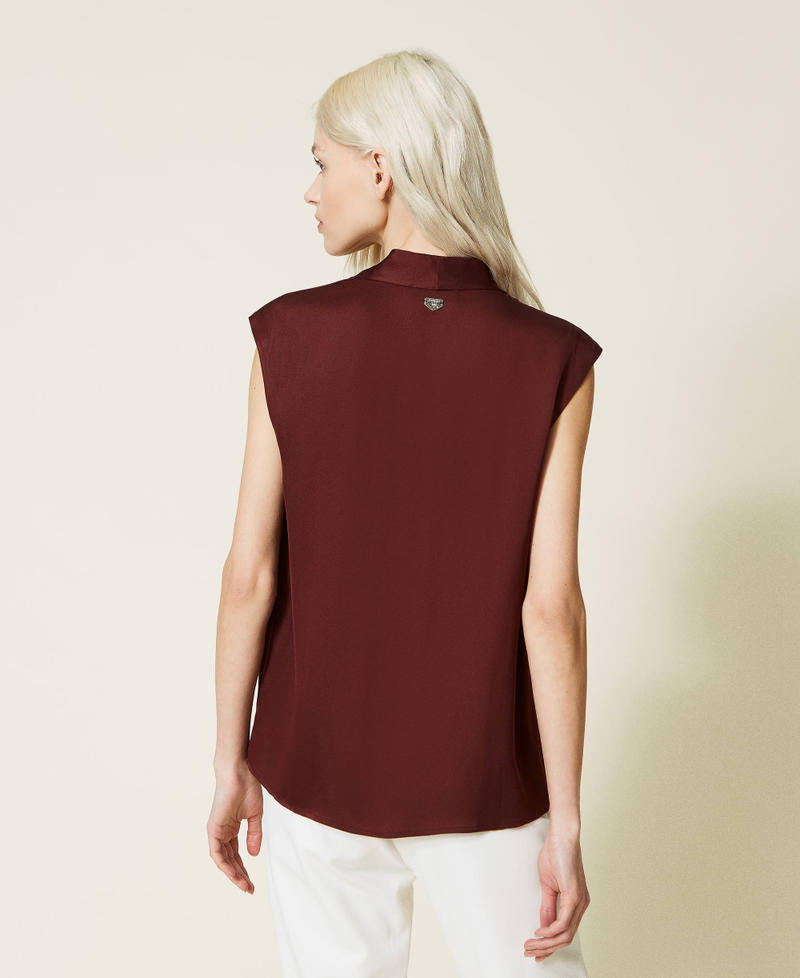 Top con manga casquillo