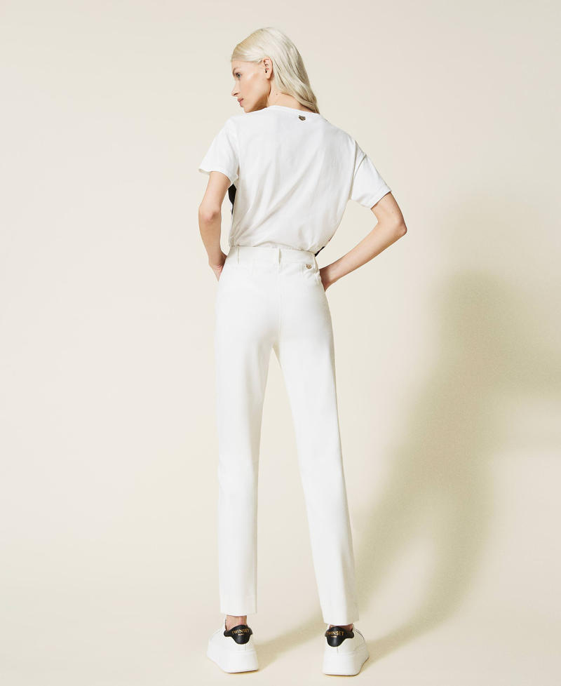 Skinny trousers with slits