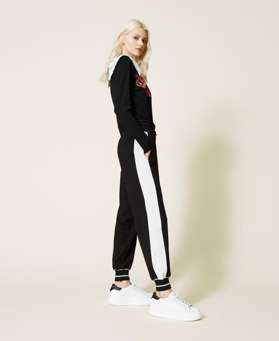 Joggers with side bands Bicolour Black / "Snow" White Woman 221LL26QQ_03710_01