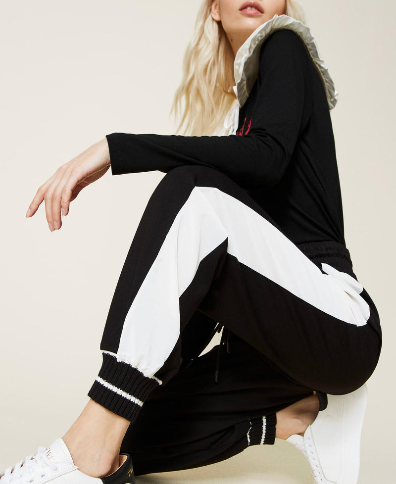 Joggers with side bands Bicolour Black / "Snow" White Woman 221LL26QQ-05