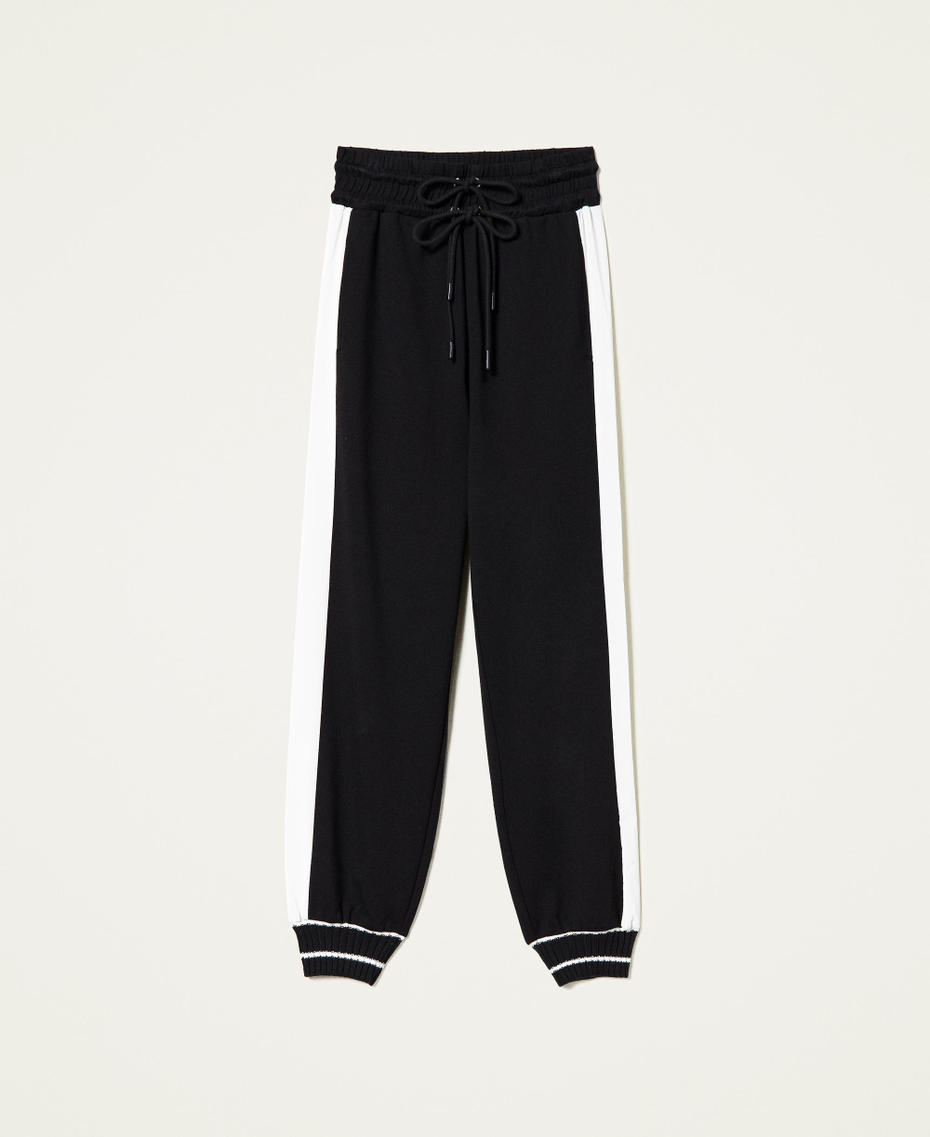 Pantalon de jogging avec bandes latérales Bicolore Noir / Blanc Neige Femme 221LL26QQ-0S