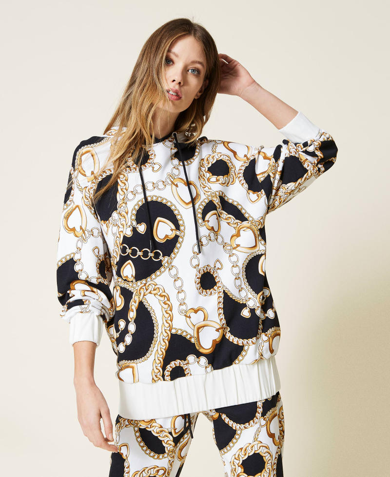 Sudadera con estampado de corazones y cadenas