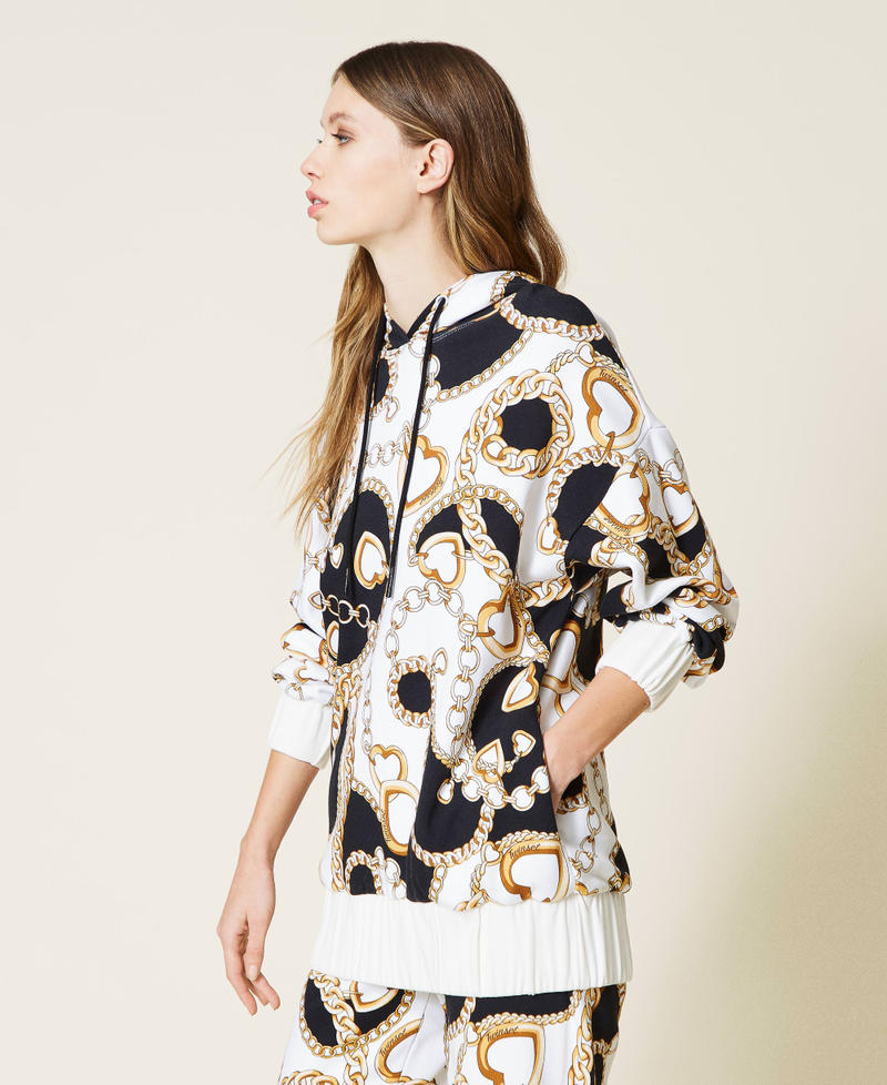 Sudadera con estampado de corazones y cadenas