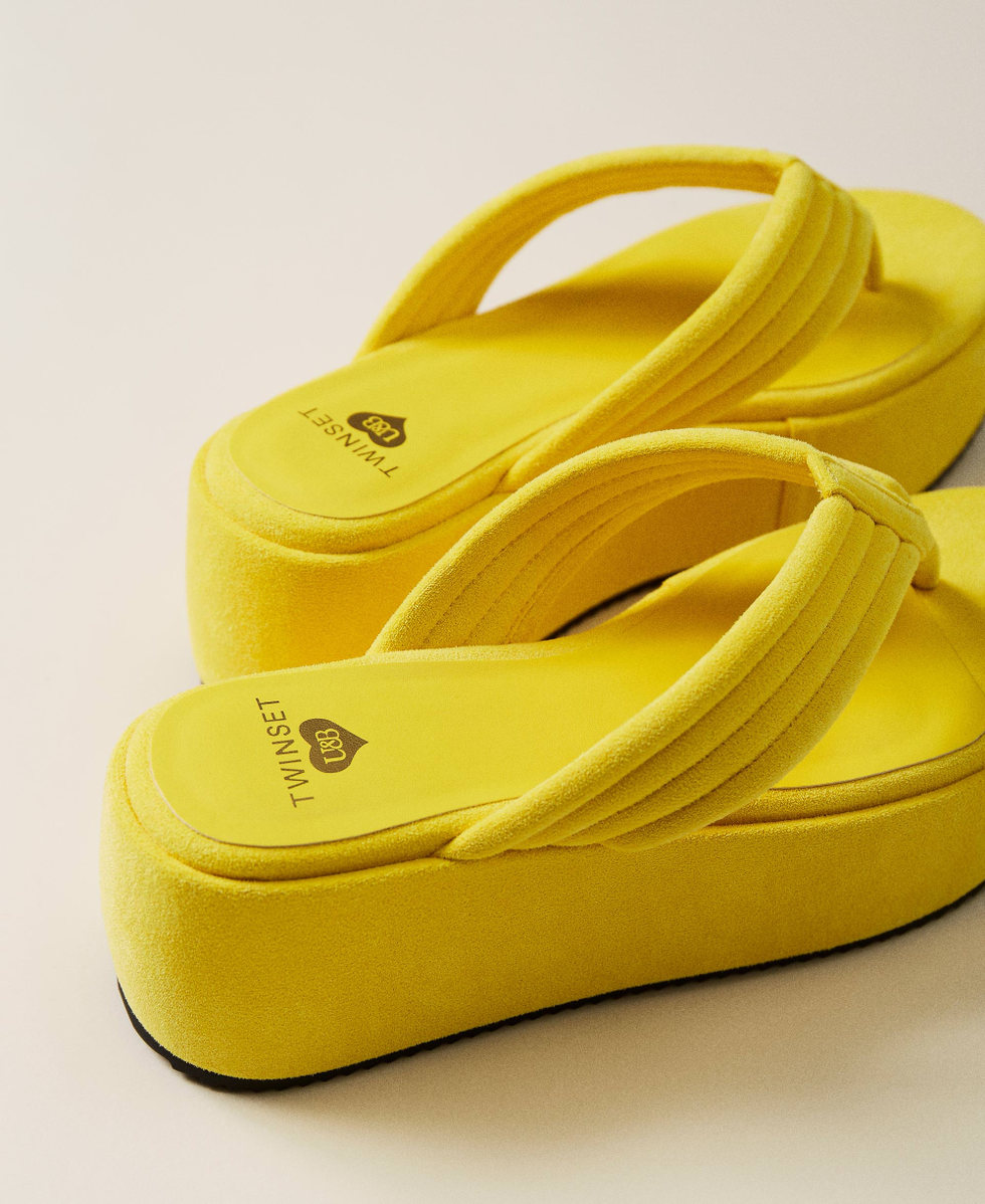 Platform thong sandals with stitching