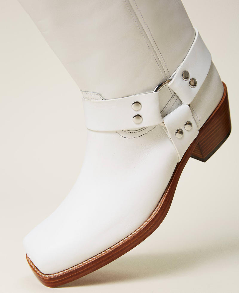 Leather boots with straps