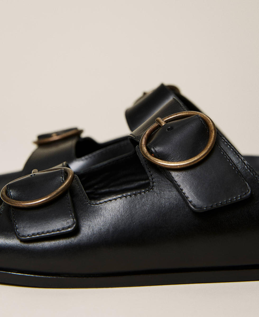 Leather sandals with double buckle