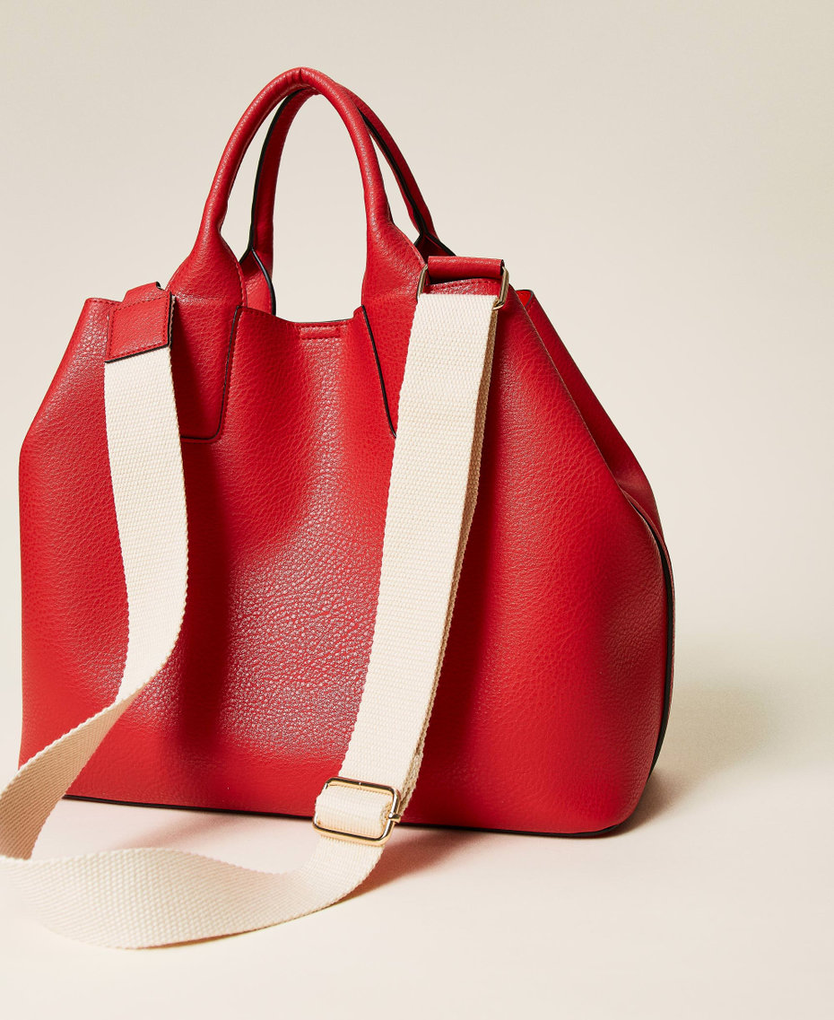 Shopper with openwork logo