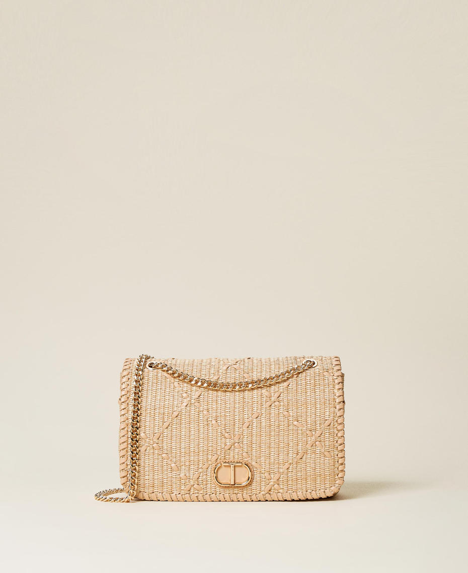 Bag with weaved raffia-like flap