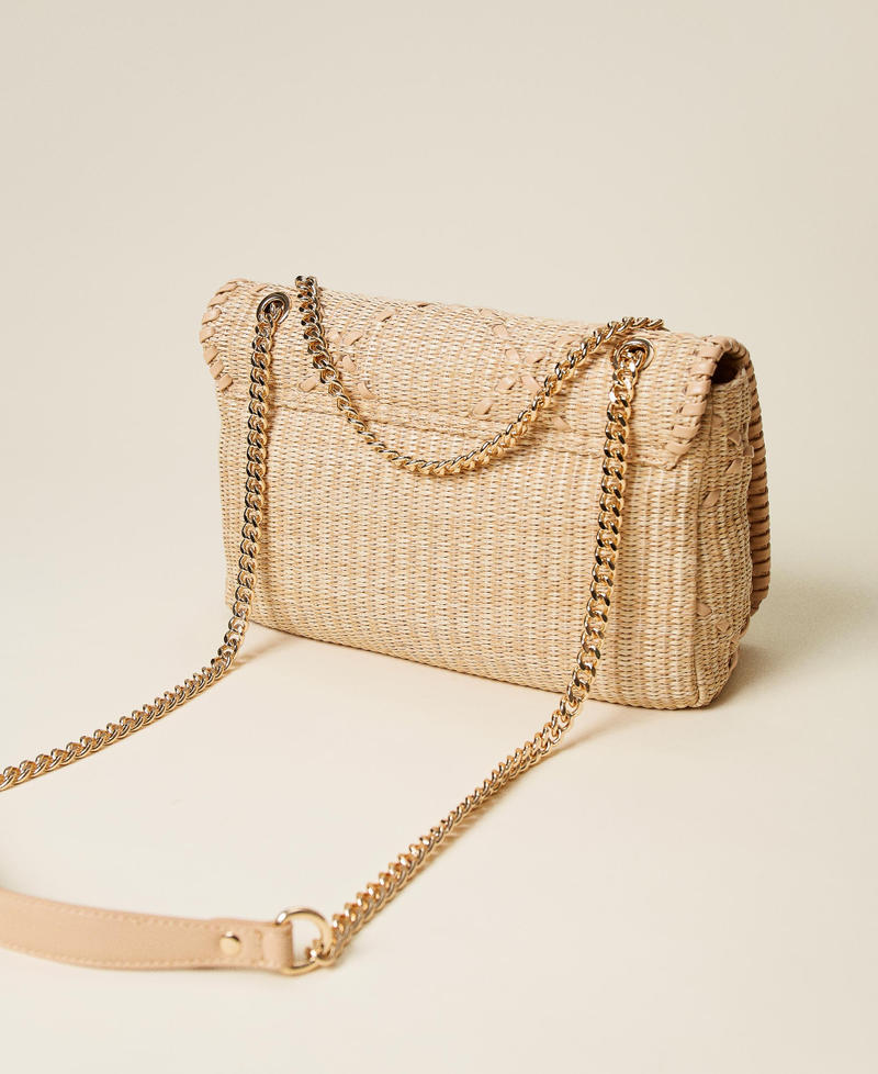 Bag with weaved raffia-like flap