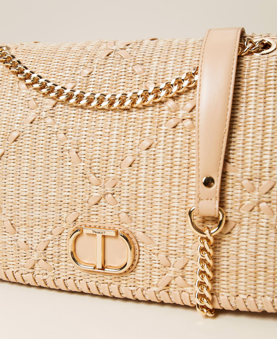 Bag with weaved raffia-like flap