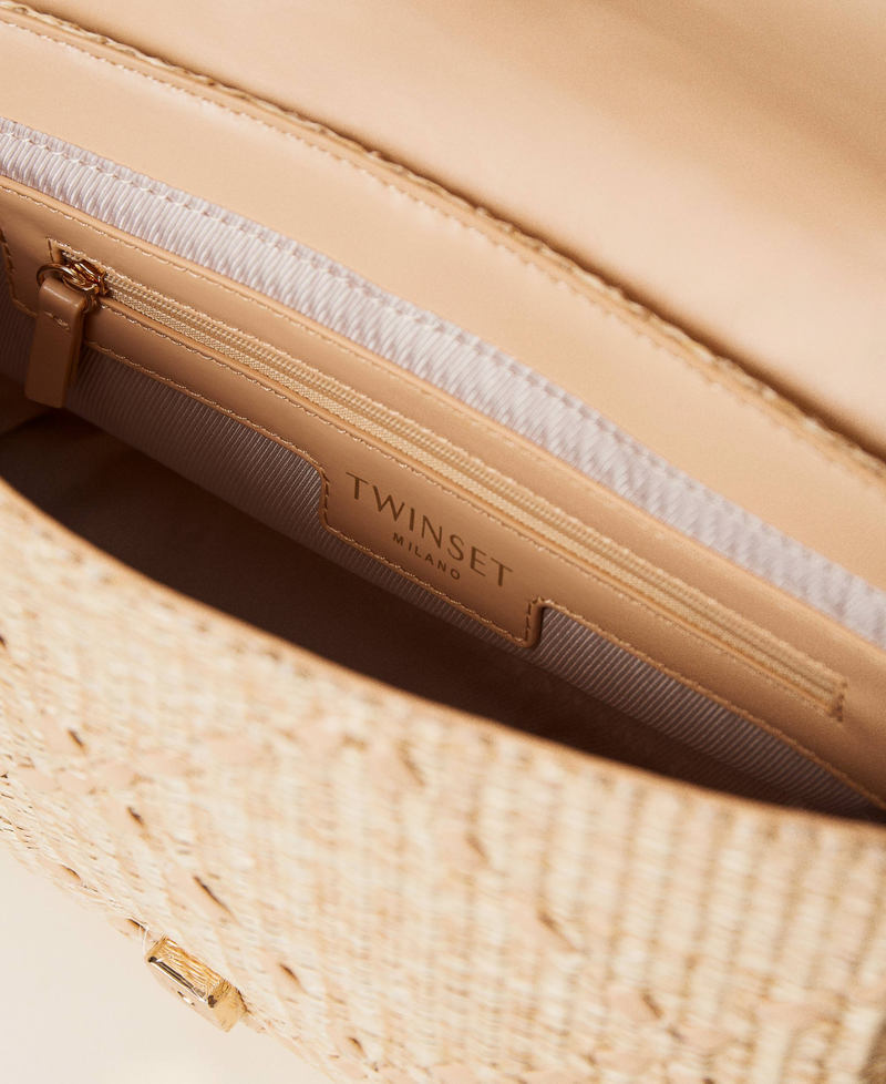 Bag with weaved raffia-like flap