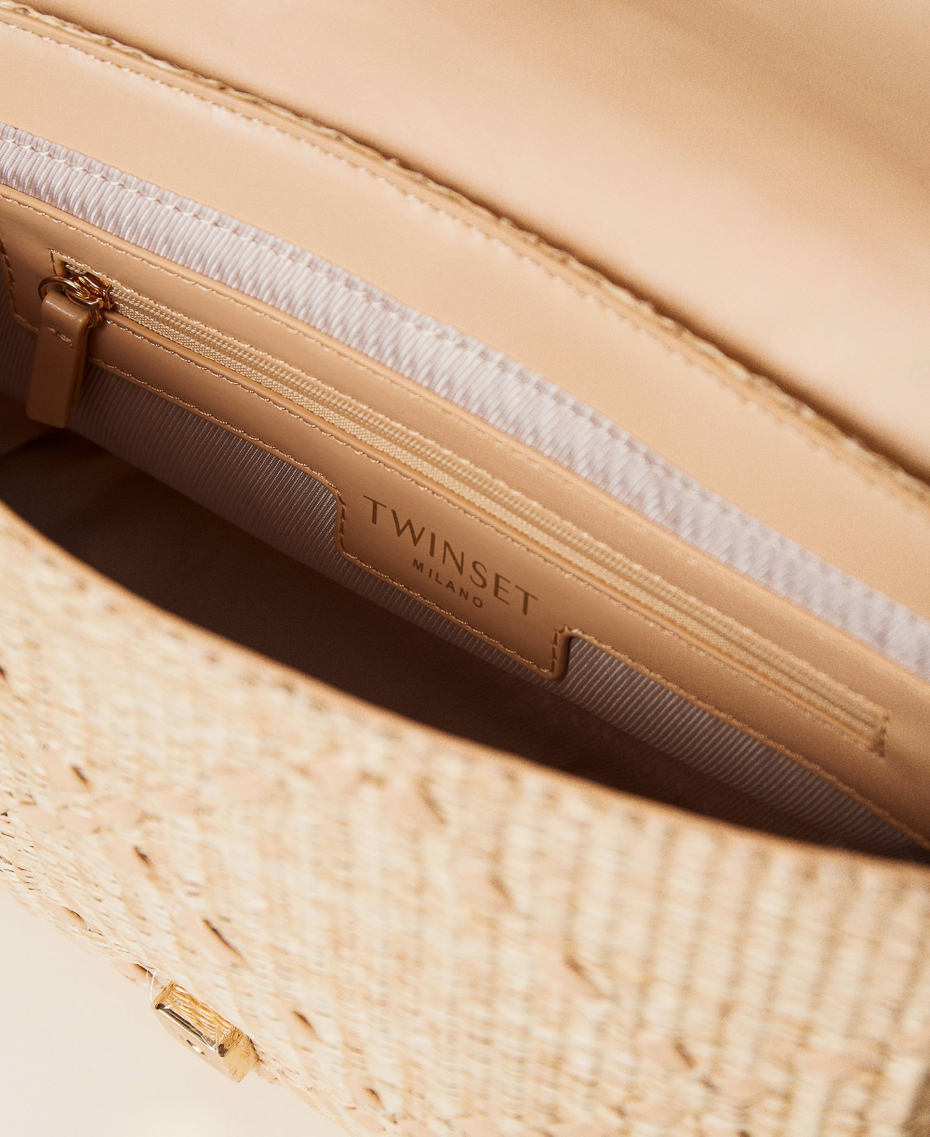 Bag with weaved raffia-like flap