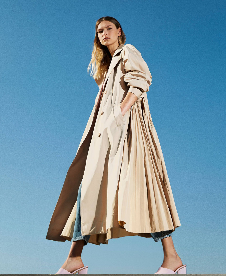 Long trench coat with pleated taffeta inserts