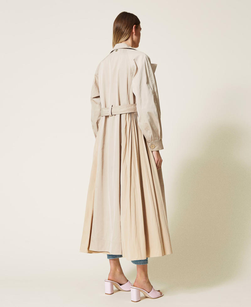 Long trench coat with pleated taffeta inserts
