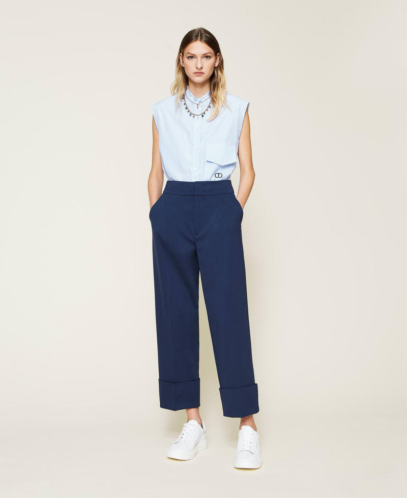 Pantaloni cropped con risvolto