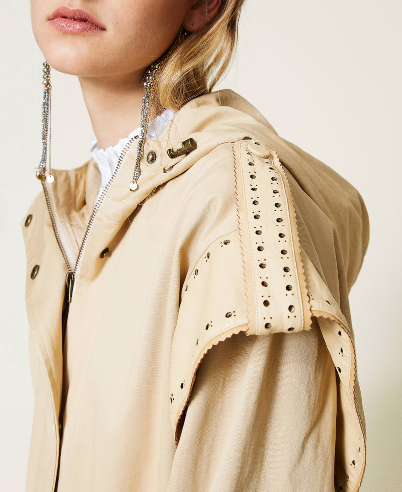 Parka coat with openwork embroidery