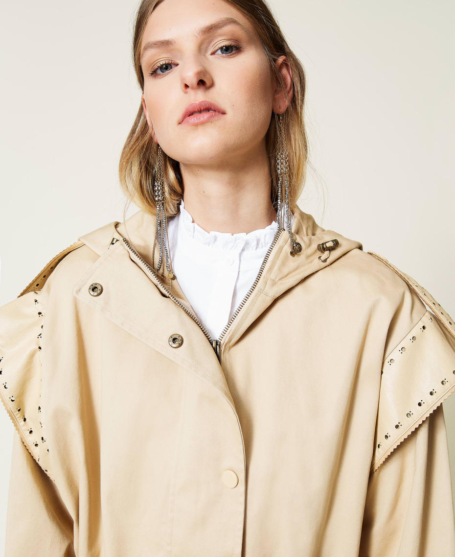 Parka coat with openwork embroidery