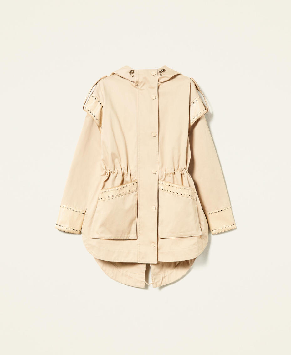 Parka coat with openwork embroidery