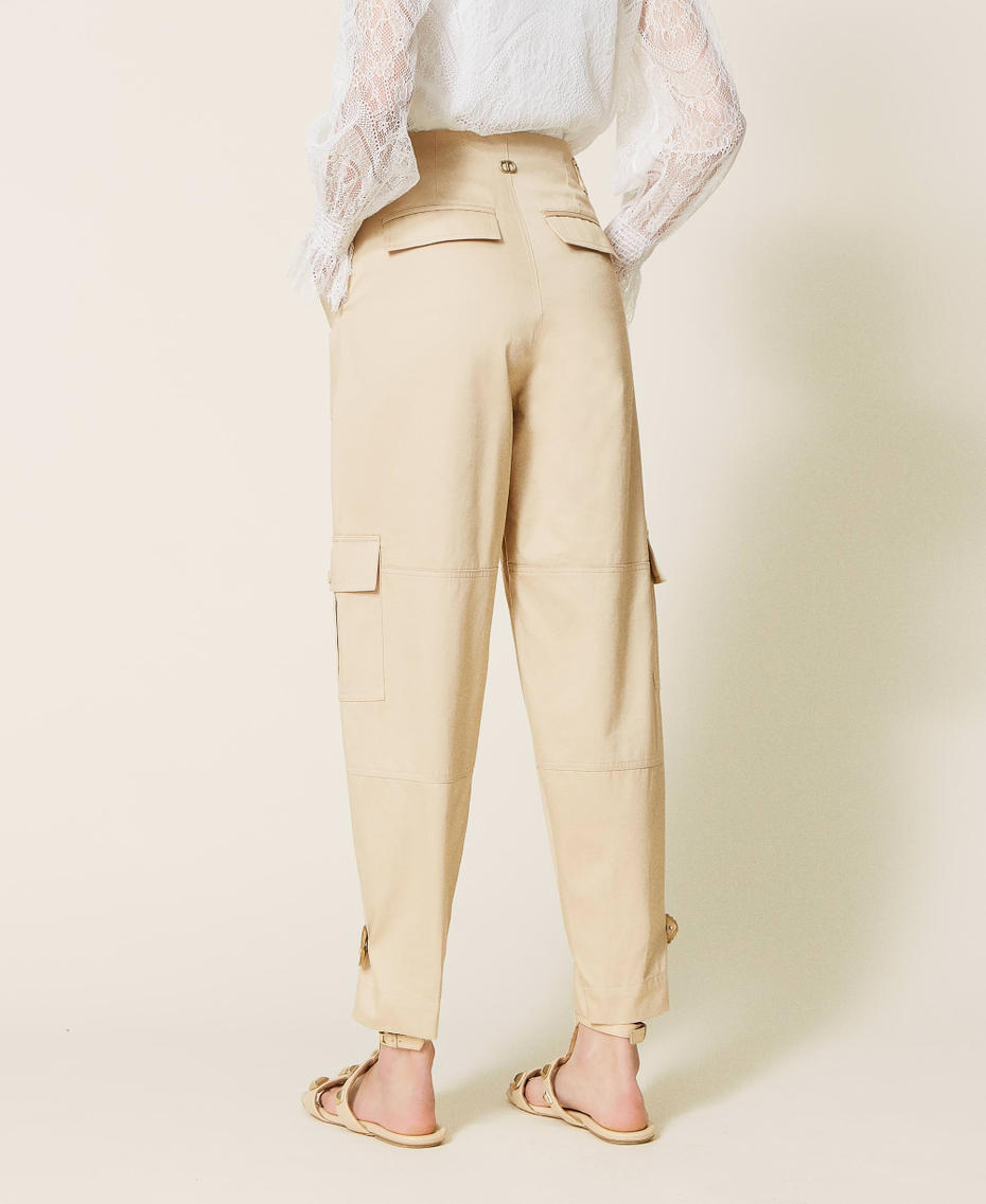Cargo trousers with openwork embroidery