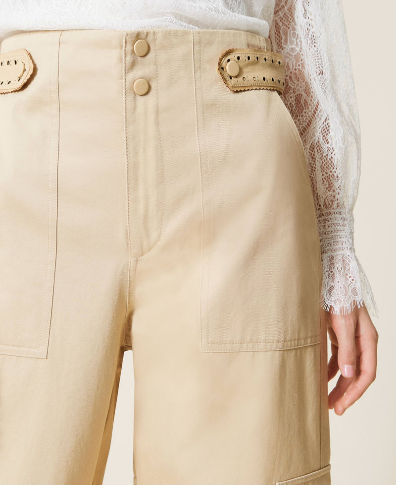 Cargo trousers with openwork embroidery