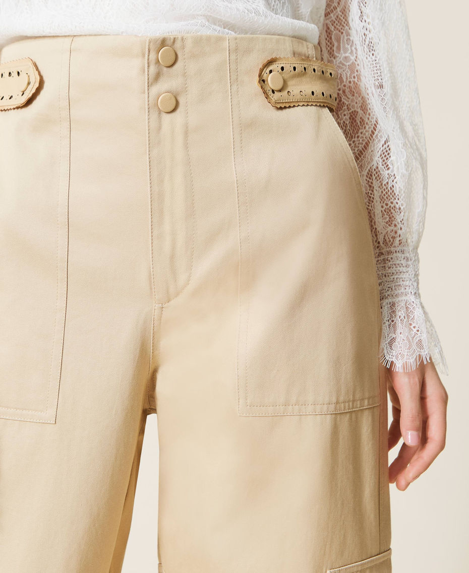 Cargo trousers with openwork embroidery
