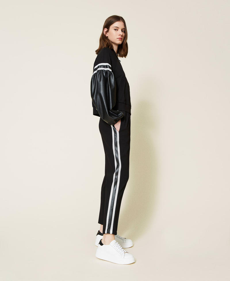 Pantalon avec bandes latérales Bicolore Noir / Blanc Neige Femme 221TP2531-01