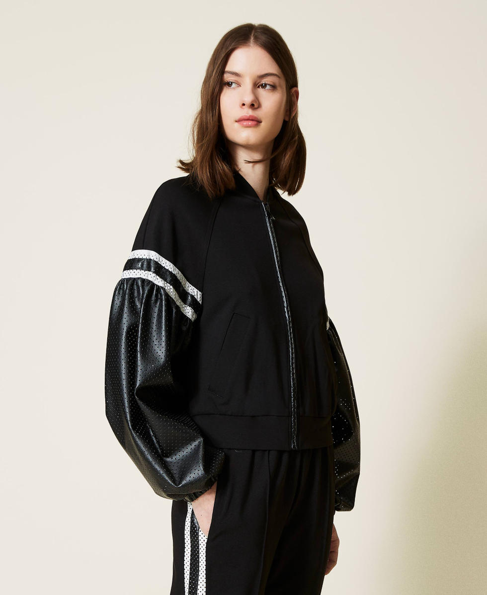 Sweatshirt with openwork sleeves
