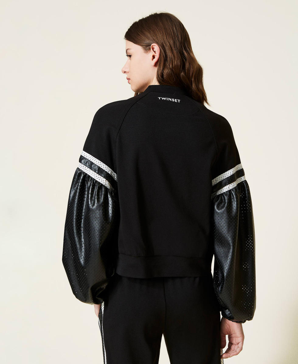 Sweatshirt with openwork sleeves