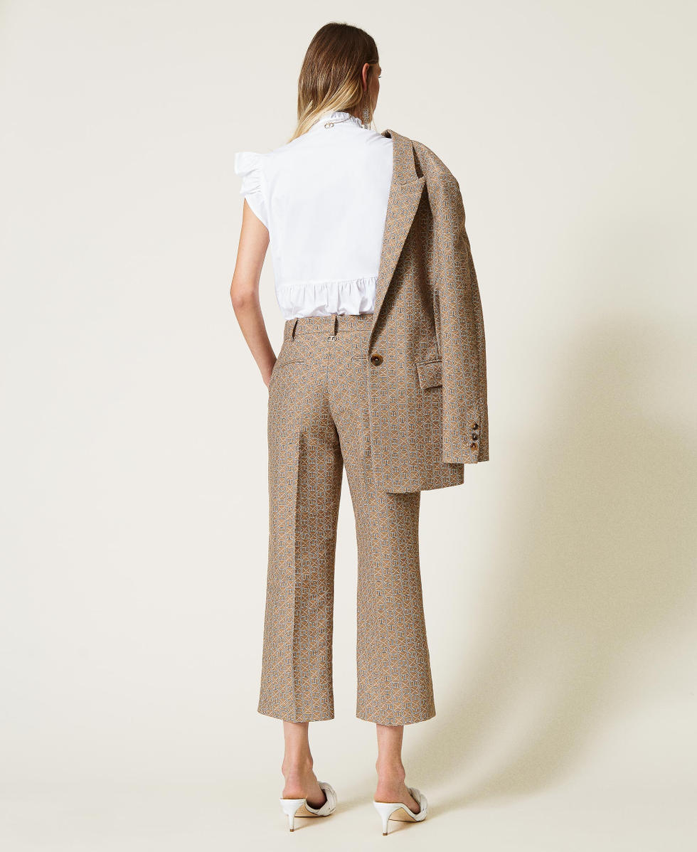 Jacquard trousers with all over logo Woman, Brown | TWINSET