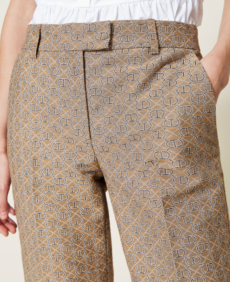 Jacquard trousers with all over logo