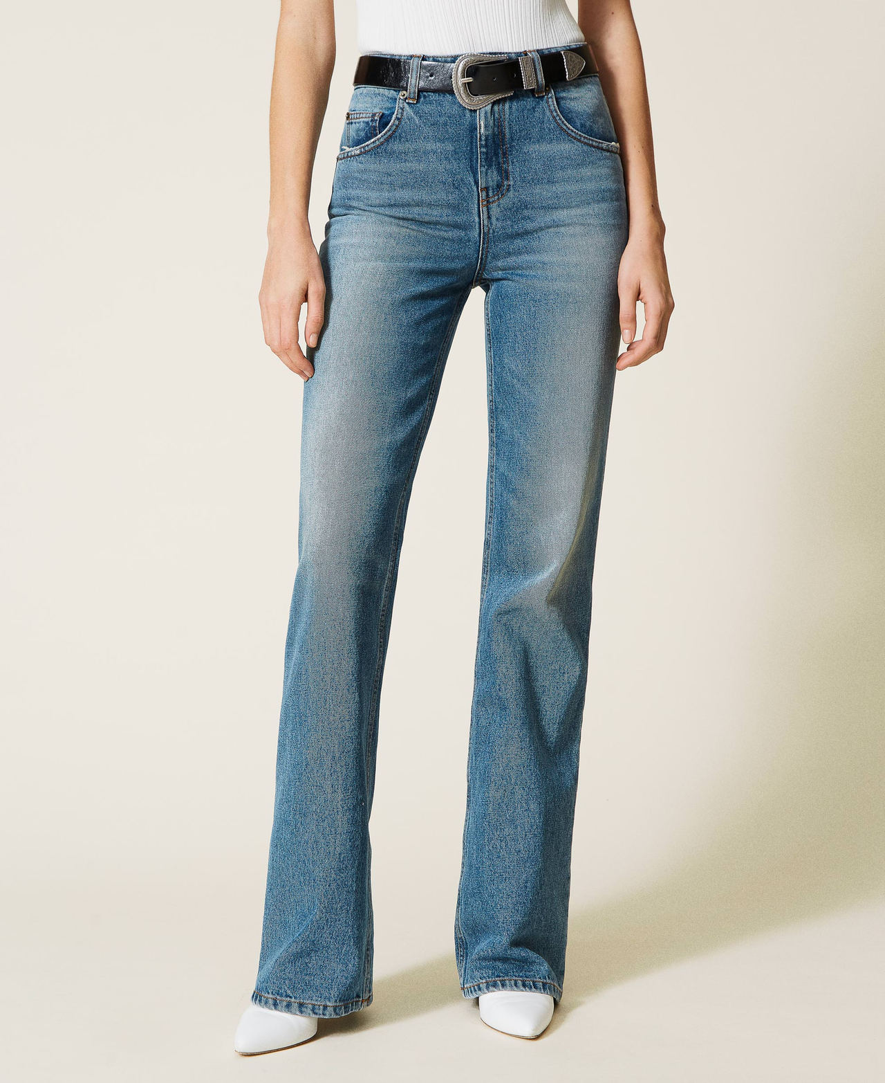 High waist flared jeans with green cast wash