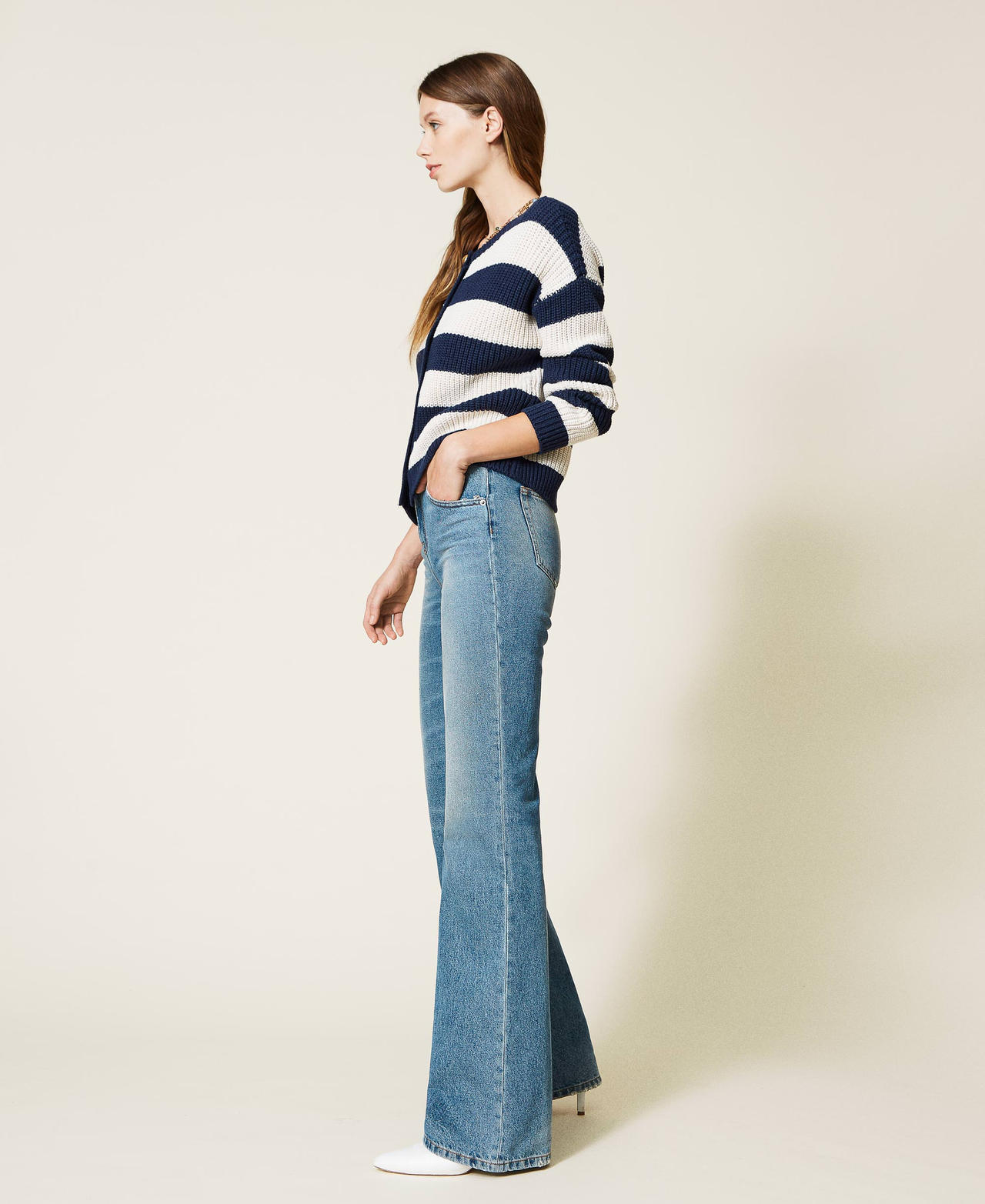 High waist flared jeans with green cast wash