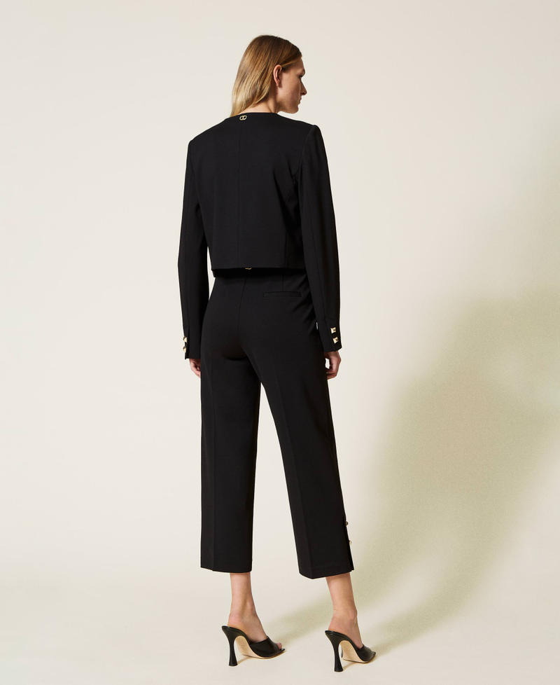 Cropped trousers with studs