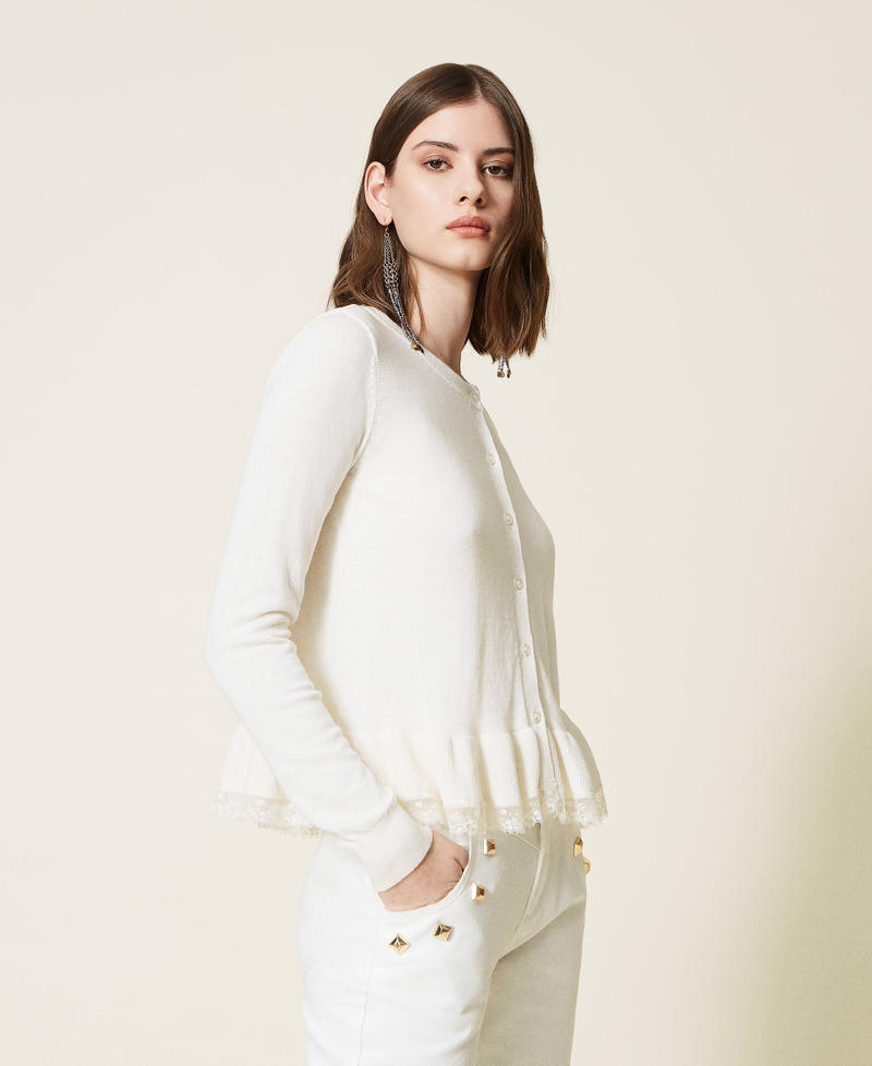 Cardigan with flounce and lace