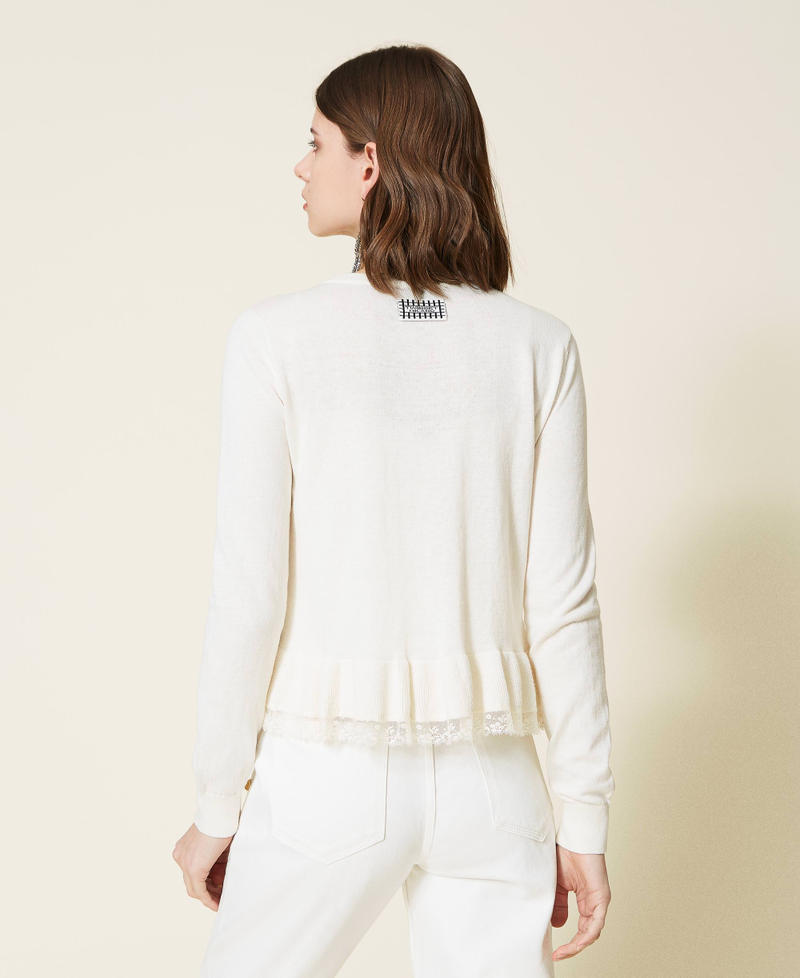 Cardigan with flounce and lace