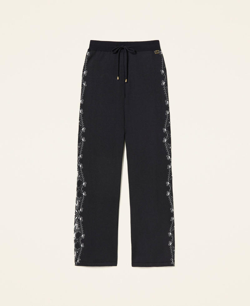 Trousers with bandanna print