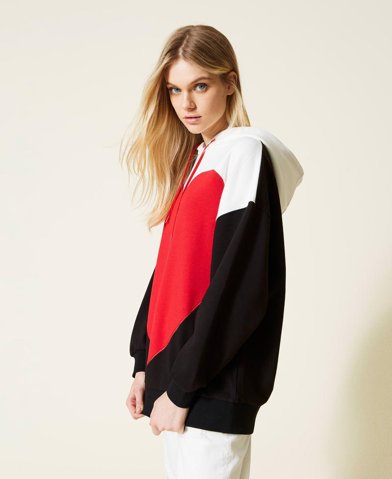 Maxi felpa con cuore a intarsio