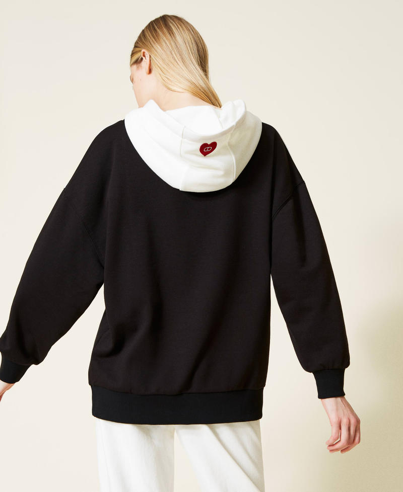 Maxi felpa con cuore a intarsio