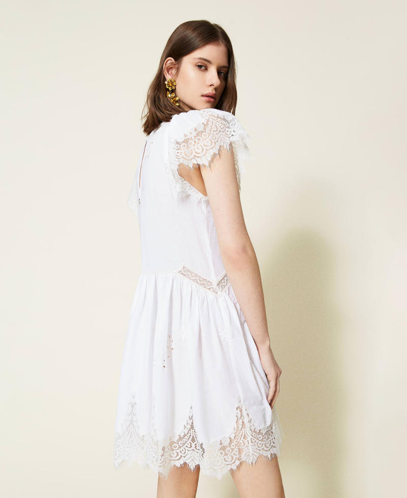 Hand-embroidered dress with inlaid lace White Woman 221TT2021-02